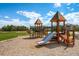 Community playground featuring slides and climbing structures for children to enjoy active play at 9180 Rolling Way # 303, Parker, CO 80134