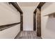 Large walk-in closet with custom shelves at 9180 Rolling Way # 303, Parker, CO 80134