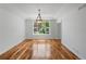 Dining room with modern furnishings, stylish rug and chandelier at 14325 N Santa Fe St, Broomfield, CO 80023