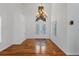 Bright entryway with high ceilings, chandelier, and decorative doors at 14325 N Santa Fe St, Broomfield, CO 80023