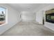 Large living room with a fireplace and lots of natural light at 14325 N Santa Fe St, Broomfield, CO 80023