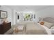 Large bedroom featuring a cozy sitting area with fireplace at 14325 N Santa Fe St, Broomfield, CO 80023