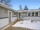 Inviting entrance showcasing the house number and well-maintained exterior at 7082 W 68Th Pl, Arvada, CO 80003