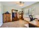 Bedroom with natural light and furnishings at 7573 S Saulsbury Ct, Littleton, CO 80128