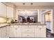 Stylish kitchen featuring granite countertops and an open view to the living spaces at 7573 S Saulsbury Ct, Littleton, CO 80128