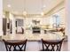 Updated kitchen with stainless steel appliances and granite countertops at 7573 S Saulsbury Ct, Littleton, CO 80128