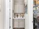 Butler pantry with storage solutions, cabinets, and countertops makes it the perfect space for organizing pantry items at 2578 Palau Way, Castle Rock, CO 80109