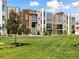 Multi-story condos showcasing contemporary exteriors and well maintained landscaping at 2578 Palau Way, Castle Rock, CO 80109