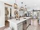 This kitchen is spacious and light with updated appliances, a large island, and an open floor plan at 2578 Palau Way, Castle Rock, CO 80109