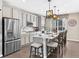 Bright, modern kitchen with stainless steel appliances, a kitchen island and sleek cabinetry, making it ideal for cooking at 2578 Palau Way, Castle Rock, CO 80109
