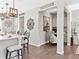 Kitchen features a breakfast bar, pendant lighting, and an adjacent nook with a built-in desk and chair at 2578 Palau Way, Castle Rock, CO 80109