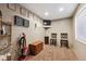 Basement features seating, storage, and carpet, creating a cozy and functional space at 2529 S Truckee Way, Aurora, CO 80013