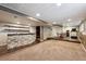 Finished basement boasting a stone bar, recessed lighting, and space for dining and entertainment at 2529 S Truckee Way, Aurora, CO 80013