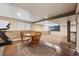Finished basement featuring dark wood floors, recessed lighting, with space for games and exercise at 2529 S Truckee Way, Aurora, CO 80013
