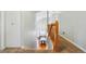 Upstairs hallway and dining room with natural light, wood floors, and stairs at 2529 S Truckee Way, Aurora, CO 80013