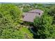 Aerial view of the property showcasing the lush landscaping and private backyard at 559 E 2Nd Ave, Castle Rock, CO 80108
