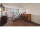 Cozy bedroom with neutral carpet, natural light, and coordinating dresser at 943 S Zeno Way # 207, Aurora, CO 80017