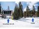 Snowflake ski lift near Condo, surrounded by fresh powder snow at 655 Four O Clock Rd # 104, Breckenridge, CO 80424
