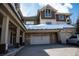 Exterior with a two car garage at 655 Four O Clock Rd # 104, Breckenridge, CO 80424