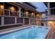 Exterior of a house with a private hot tub and outdoor deck at 655 Four O Clock Rd # 104, Breckenridge, CO 80424