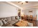 Inviting living room features a comfortable couch, dining table, and seamless access to the adjacent kitchen area at 655 Four O Clock Rd # 104, Breckenridge, CO 80424