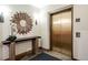 Welcoming lobby area with stylish decor and elevator access at 655 Four O Clock Rd # 104, Breckenridge, CO 80424