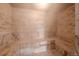 Inviting sauna room tiled with stone benches at 655 Four O Clock Rd # 104, Breckenridge, CO 80424