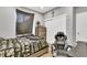 Comfortable bedroom featuring gray walls, closet, and fan for a relaxing ambiance at 13464 E 107Th Ave, Commerce City, CO 80022