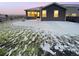 An enclosed backyard features minimal landscaping and lawn at 27699 E 7Th Ln, Aurora, CO 80018