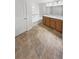Bathroom featuring dual vanities and a tub with tile surround at 27699 E 7Th Ln, Aurora, CO 80018