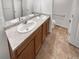 A spacious bathroom features a double vanity sink at 27699 E 7Th Ln, Aurora, CO 80018