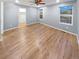 A serene main bedroom with ample lighting and hardwood floors at 27699 E 7Th Ln, Aurora, CO 80018