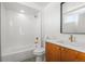 A sleek bathroom features a stylish vanity and modern finishes in an inviting atmosphere at 1864 W 41St Ave, Denver, CO 80211