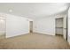 Large bedroom with neutral carpet and trim plus a walk-in closet at 1864 W 41St Ave, Denver, CO 80211