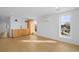 Open concept living room with hardwood floors, cabinets, and natural light at 1864 W 41St Ave, Denver, CO 80211