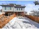 Exterior view of home with wood accents, multiple levels, and fenced yard at 1864 W 41St Ave, Denver, CO 80211