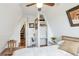 This bedroom features a reading nook and adjacent closet at 509 Paiute Rd, Evergreen, CO 80439