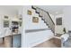 Hallway with unique wall decor and stairway access to other rooms at 509 Paiute Rd, Evergreen, CO 80439