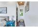 A short hallway leads to a closet in this light and bright home at 509 Paiute Rd, Evergreen, CO 80439