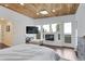 The Main Bedroom has a fireplace, television, and beautiful views from the window at 509 Paiute Rd, Evergreen, CO 80439