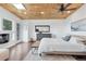Bright main bedroom features a wood ceiling, recessed lighting, ceiling fan, and ensuite bathroom at 509 Paiute Rd, Evergreen, CO 80439
