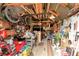 Interior of shed including work tools, grills, mountain bikes and a variety of gear at 509 Paiute Rd, Evergreen, CO 80439