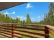 Amazing forest and mountain views from this lovely wooden deck at 509 Paiute Rd, Evergreen, CO 80439