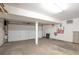 This spacious garage features a garage door and concrete flooring at 2019 S Hannibal St # C, Aurora, CO 80013