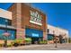 Exterior of Whole Foods Market featuring a modern brick facade at 8264 S Fillmore Way, Centennial, CO 80122