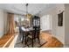 Formal dining room with hardwood floors and large windows at 7172 Waterford Ct, Niwot, CO 80503