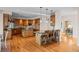 Open kitchen with breakfast nook and view into dining room at 7172 Waterford Ct, Niwot, CO 80503