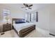 Spacious bedroom with wood bed frame and two nightstands at 9643 Truckee St, Commerce City, CO 80022