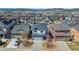 Bird's-eye view of neighborhood homes highlighting the yards, mountain views, and community layout at 3111 Youngheart Way, Castle Rock, CO 80109