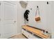 Mud room entryway features a wood bench with shoe storage and coat hooks at 3111 Youngheart Way, Castle Rock, CO 80109